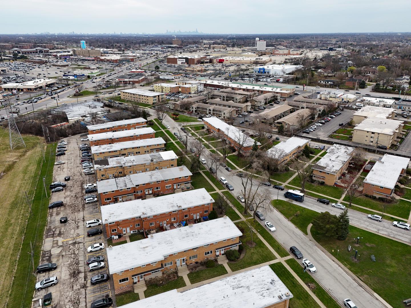 8664 Gregory Lane, Unit E Des Plaines, IL 60016 - Photo 15 of 15 an aerial view of a residential apartment building with a yard