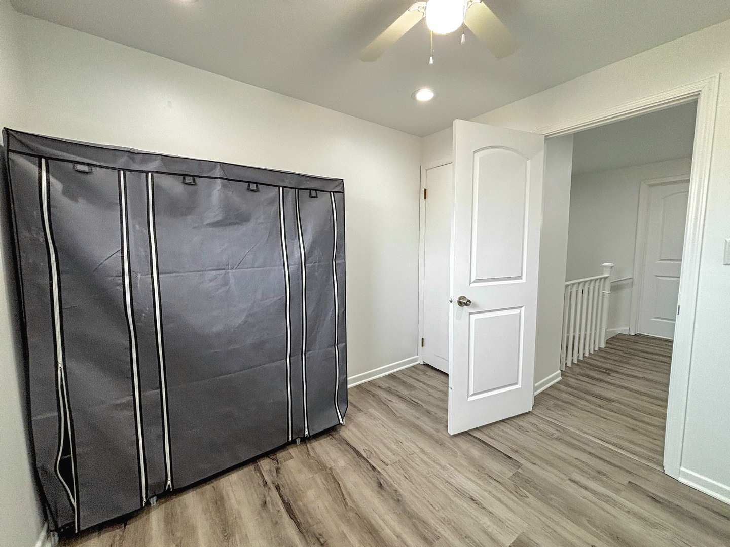 8664 Gregory Lane, Unit E Des Plaines, IL 60016 - Photo 9 of 15 a bathroom with a shower and a sink