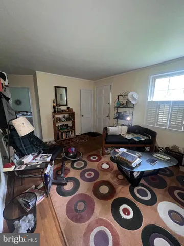 a room with furniture and a wooden floor