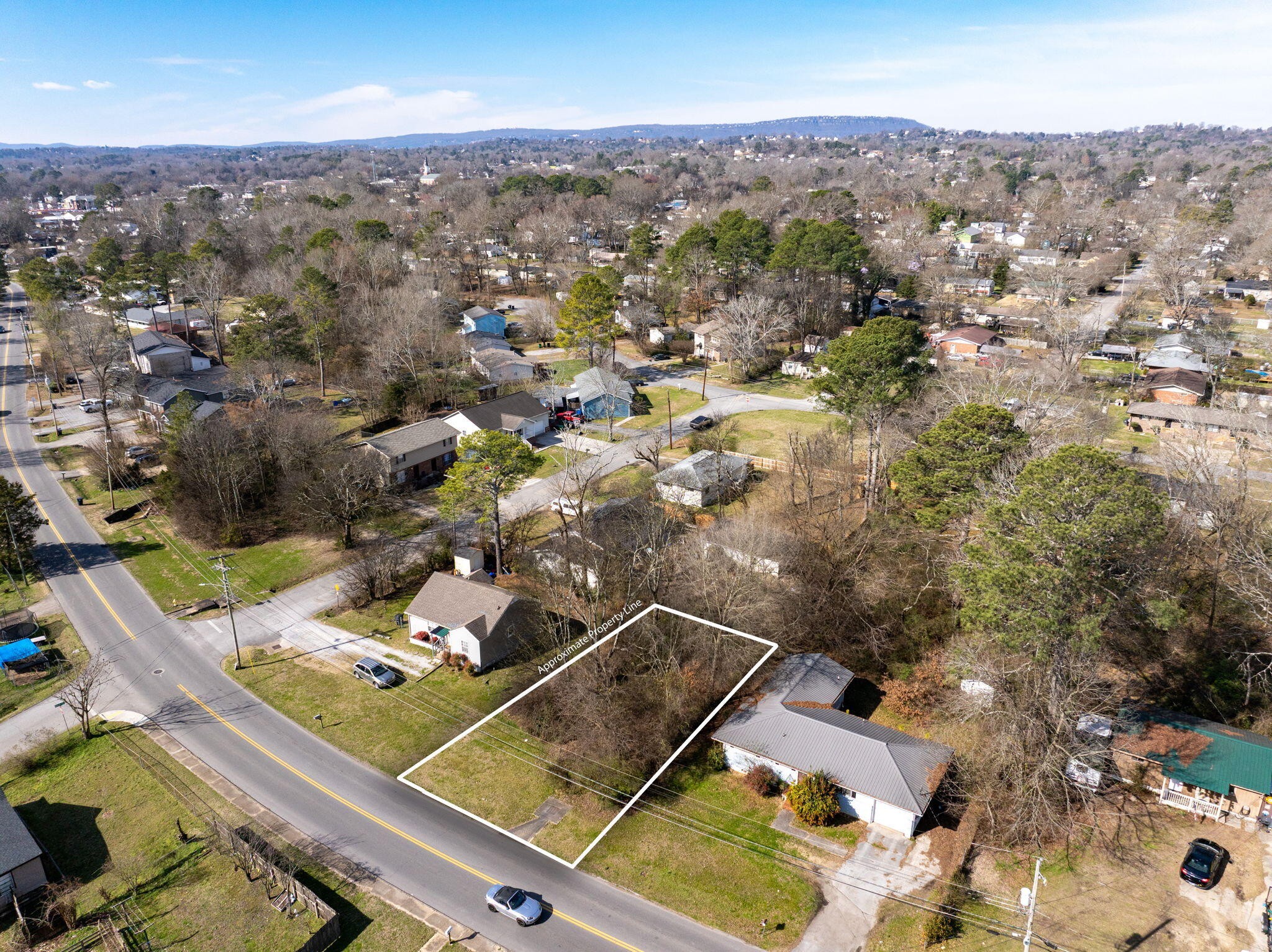an aerial view of house with yard
