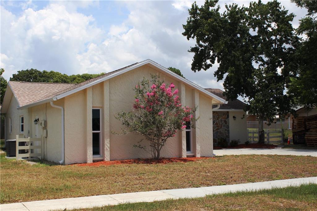 6149 Staunton Drive Holiday, FL 34690 - Photo 1 of 1 a house view with a outdoor space