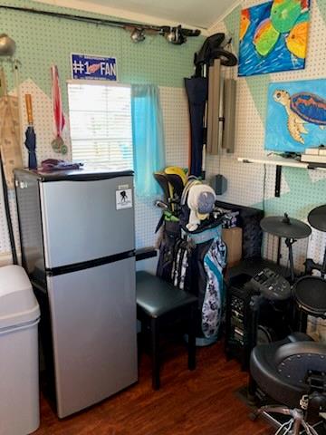 646 Southwest 33rd Cove Okeechobee, FL 34974 - Photo 14 of 19 a room with lots of furniture and wooden floor