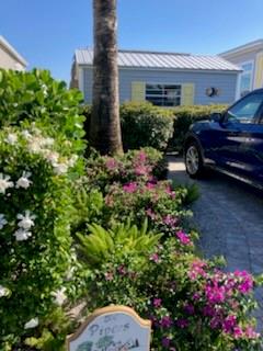 646 Southwest 33rd Cove Okeechobee, FL 34974 - Photo 2 of 19 a front view of a house with a yard and fountain