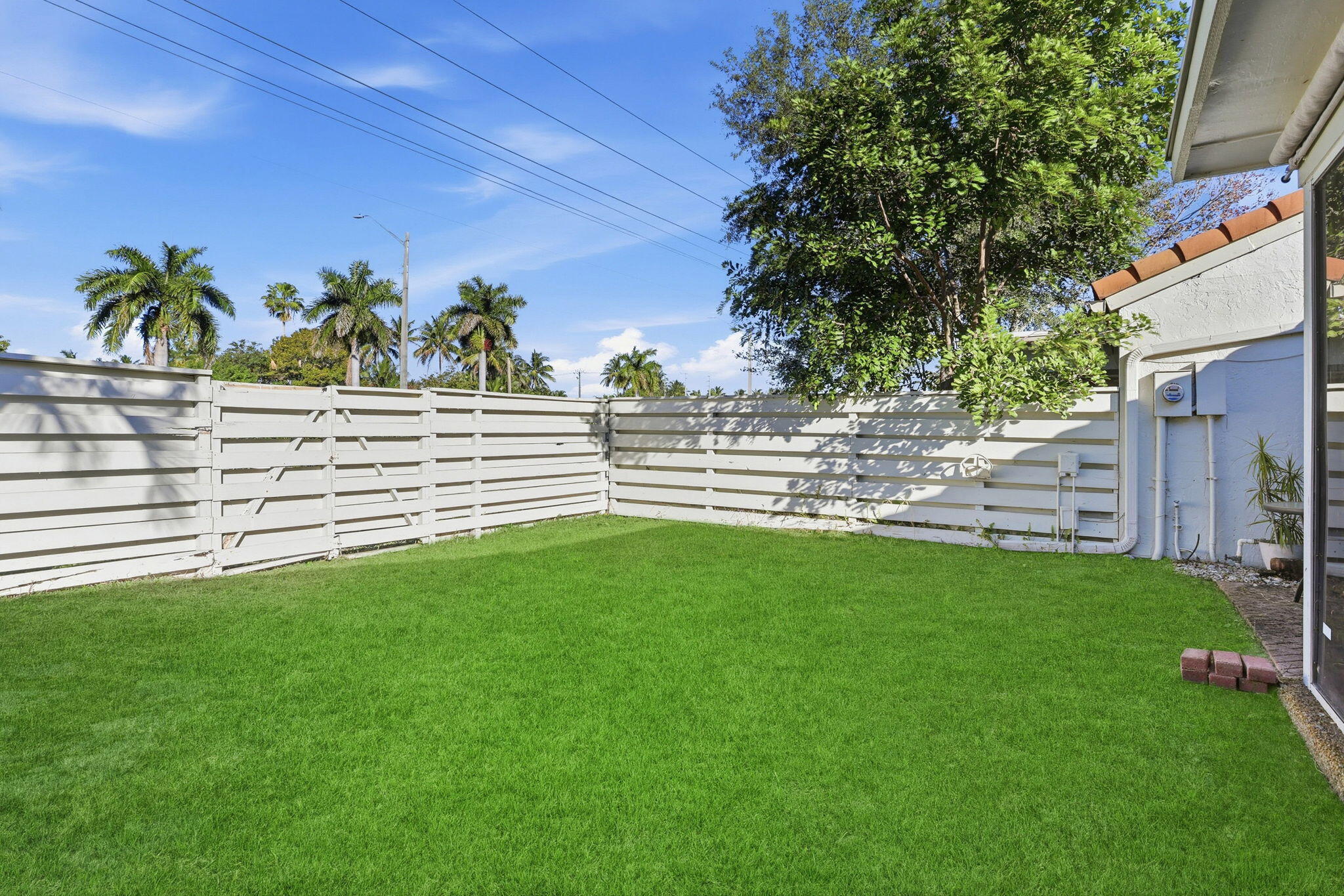 21547 Altamira Avenue Boca Raton, FL 33433 - Photo 26 of 28 10-web-or-mls-0E2A8751_grass_8e469516-5f