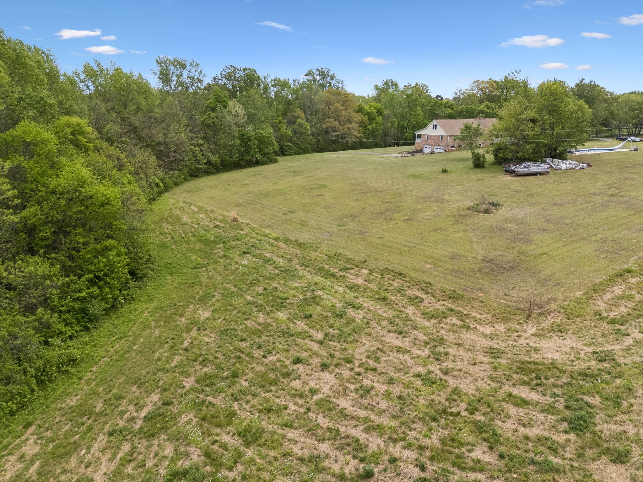 1059 Old Railroad Bed Road Taft, TN 38488 - Photo 18 of 41 a view of a big yard with lots of palm trees