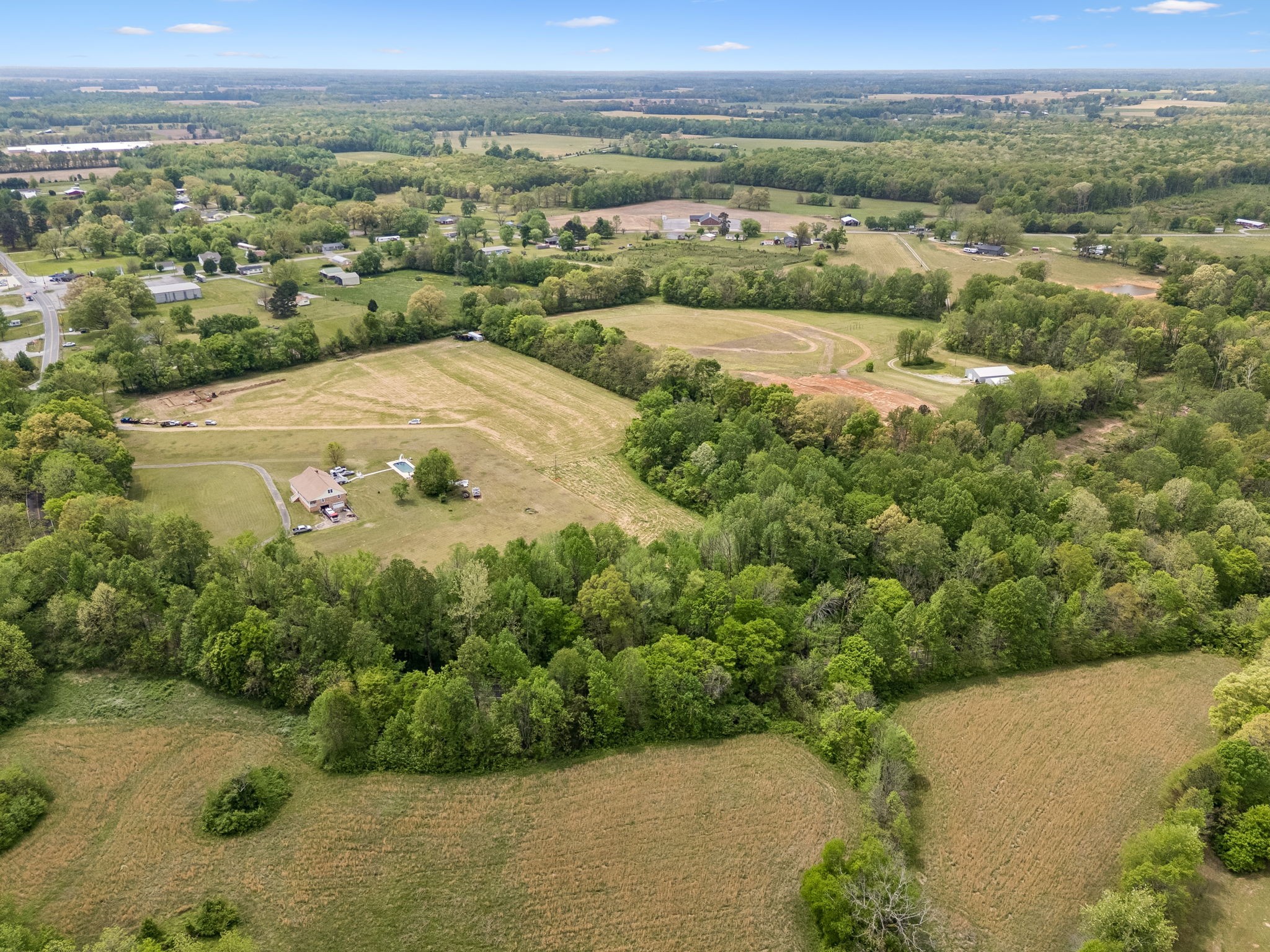 1059 Old Railroad Bed Road Taft, TN 38488 - Photo 5 of 41 an aerial view of ocean with residential house and trees around