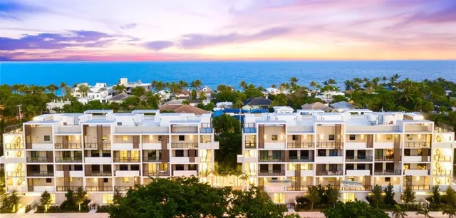 a view of a building with a city street