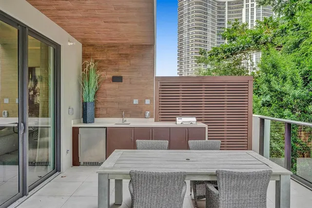 a living room with furniture and a mirror