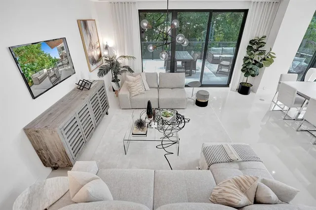 a bathroom with a tub a sink and mirror