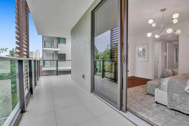 a bathroom with a toilet sink and shower