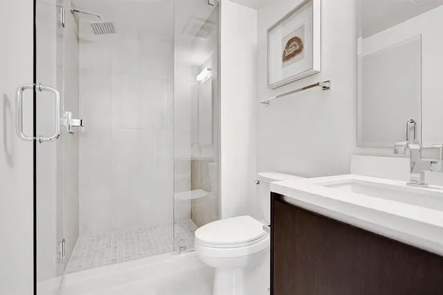 a bedroom with bed and window