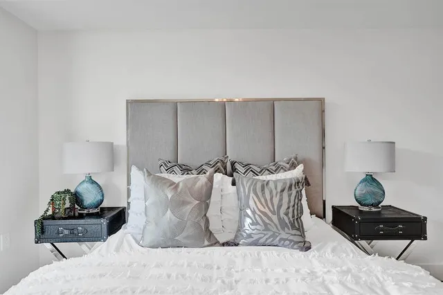 a view of swimming pool with outdoor seating and plants