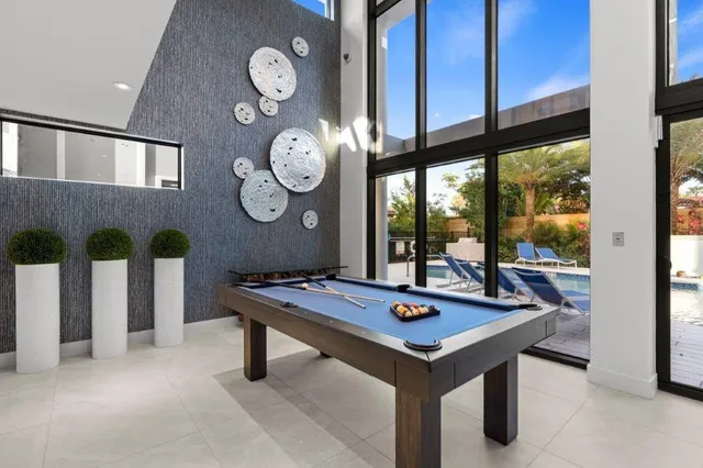 a view of a yard with palm trees