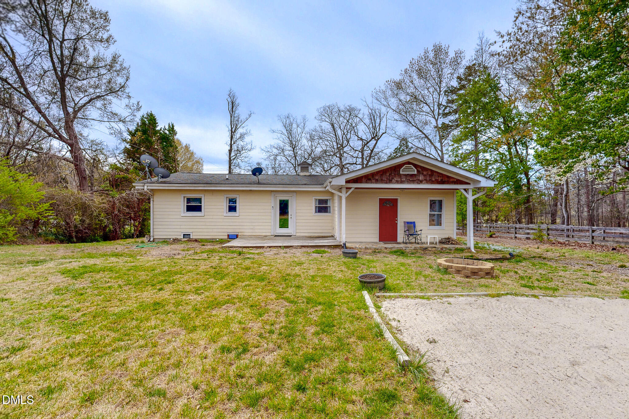 220 Bacon Road Rougemont, NC 27572 - Photo 15 of 42 a front view of a house with garden