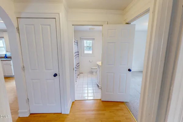 a view of room with tub and window