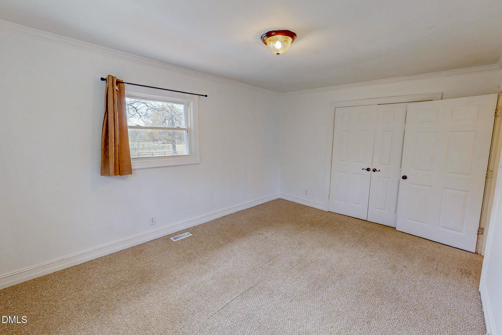 220 Bacon Road Rougemont, NC 27572 - Photo 27 of 42 a view of an empty room with a window