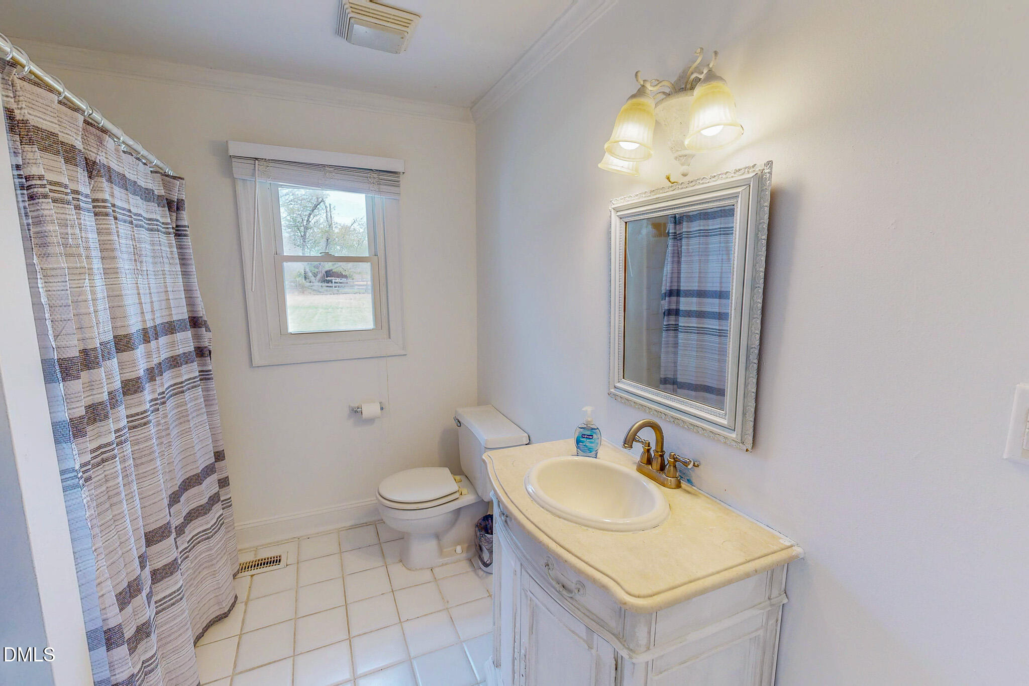 220 Bacon Road Rougemont, NC 27572 - Photo 28 of 42 a bathroom with a sink toilet and shower