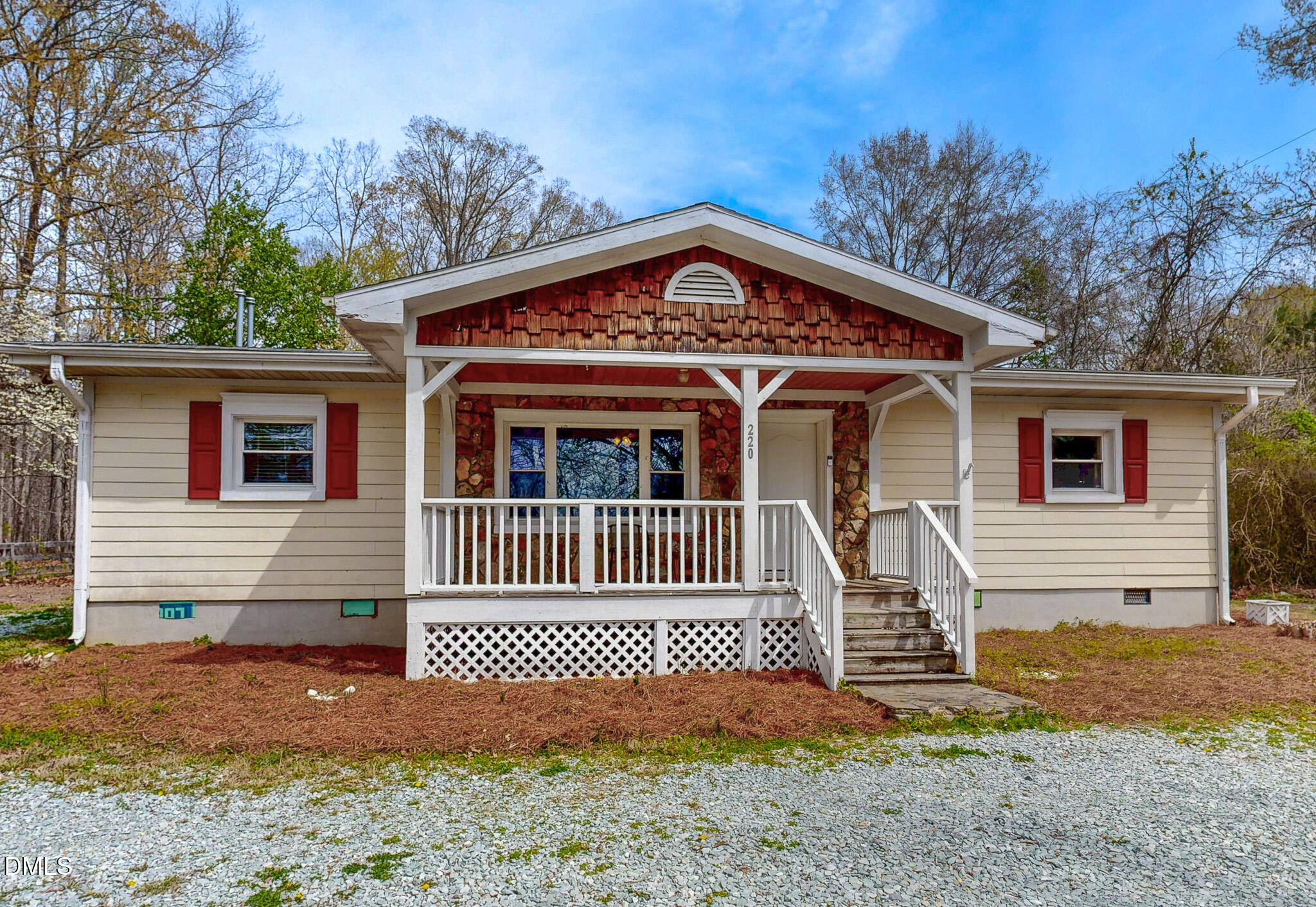 220 Bacon Road Rougemont, NC 27572 - Photo 35 of 42 a front view of a house with a garden