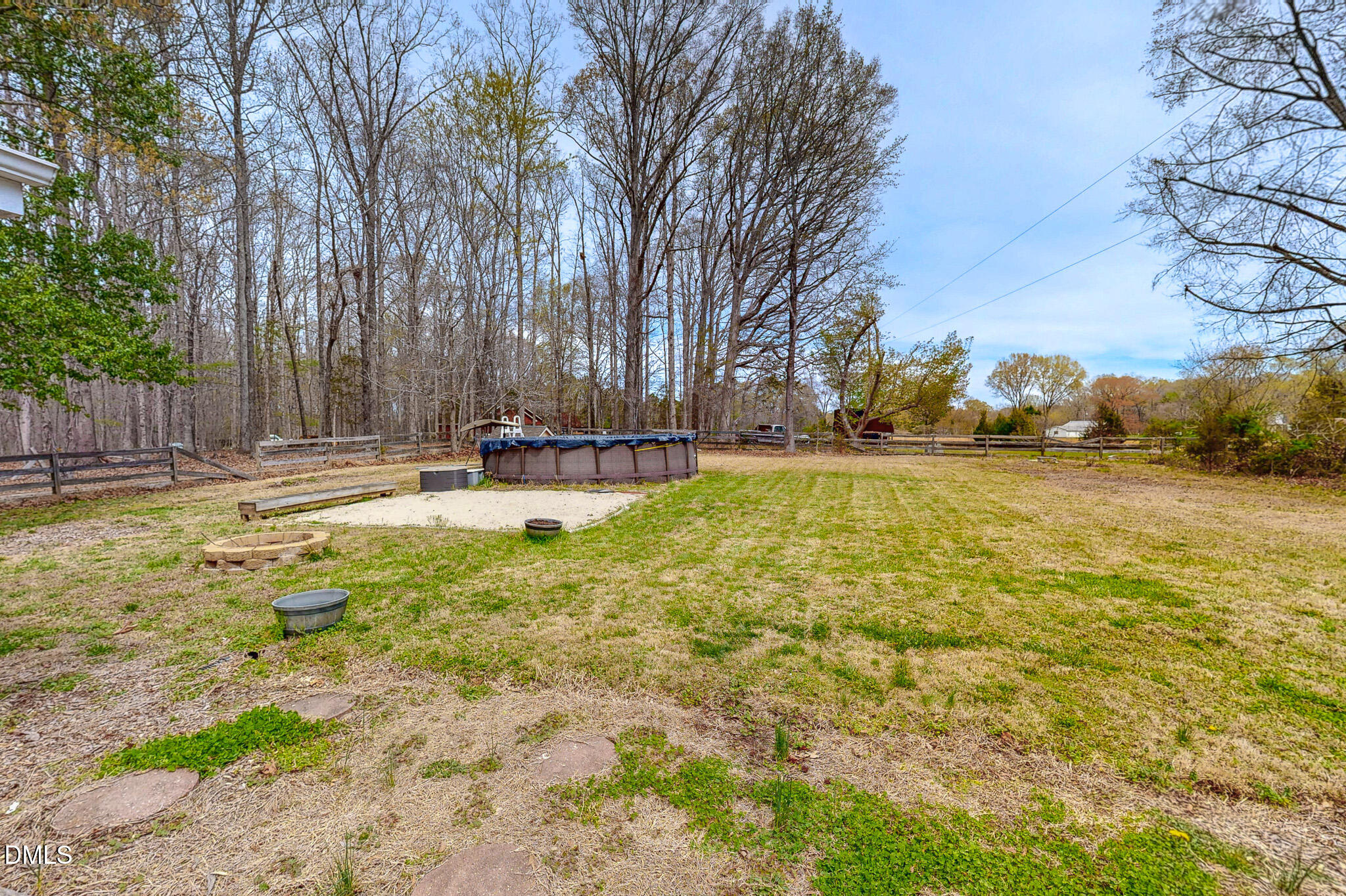 220 Bacon Road Rougemont, NC 27572 - Photo 38 of 42 a backyard of apartments with large trees