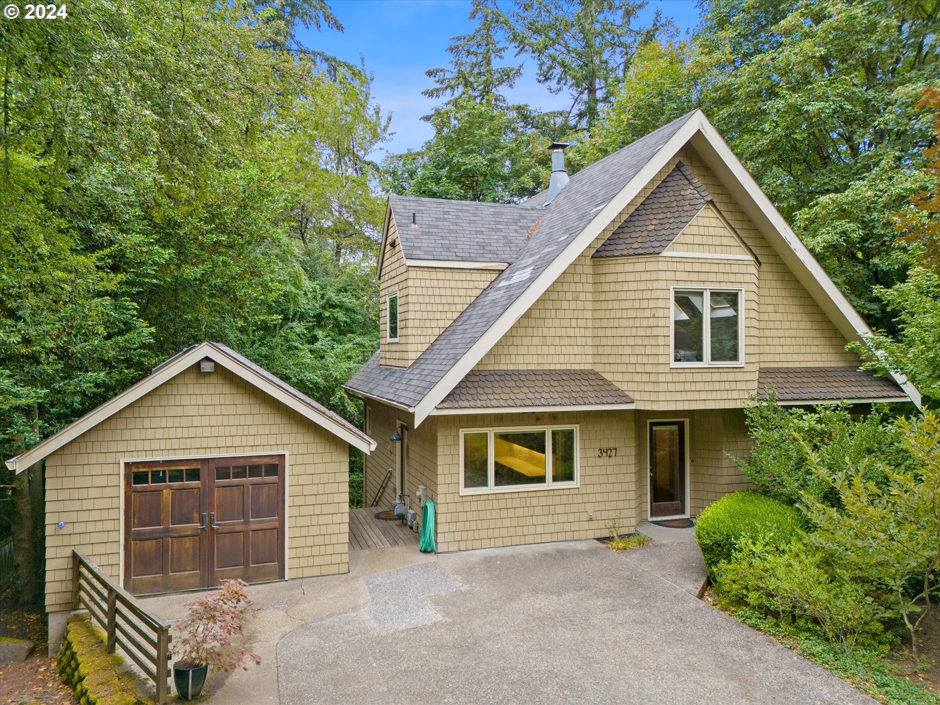 3427 Southwest Dosch Road Portland, OR 97239 - Photo 1 of 48 a view of a yard in front view of a house