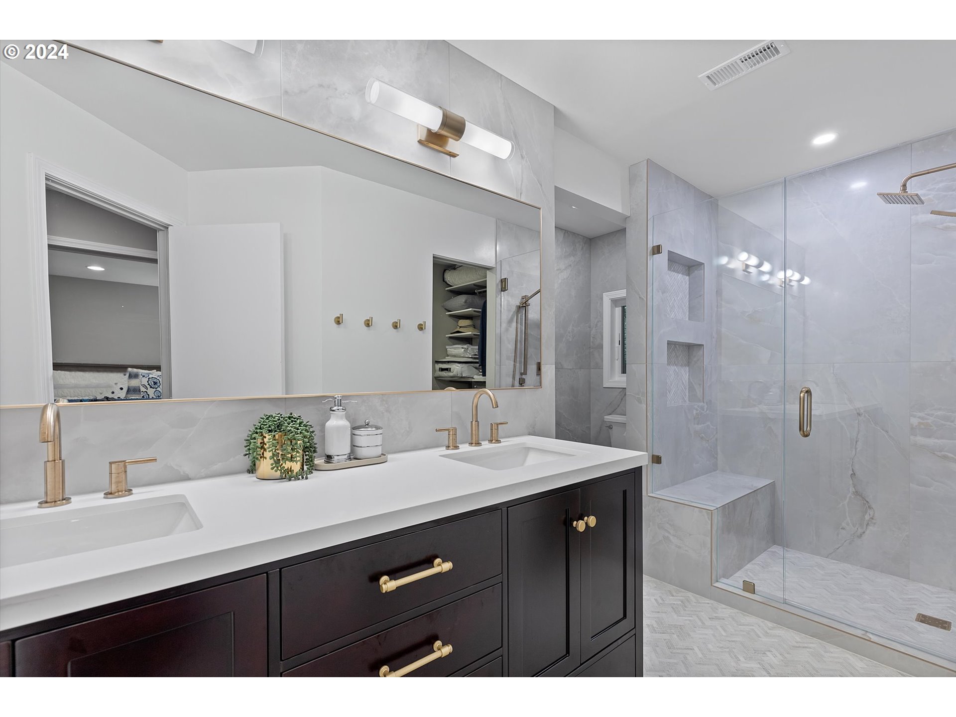 3427 Southwest Dosch Road Portland, OR 97239 - Photo 12 of 48 a bathroom with a sink a shower and a mirror