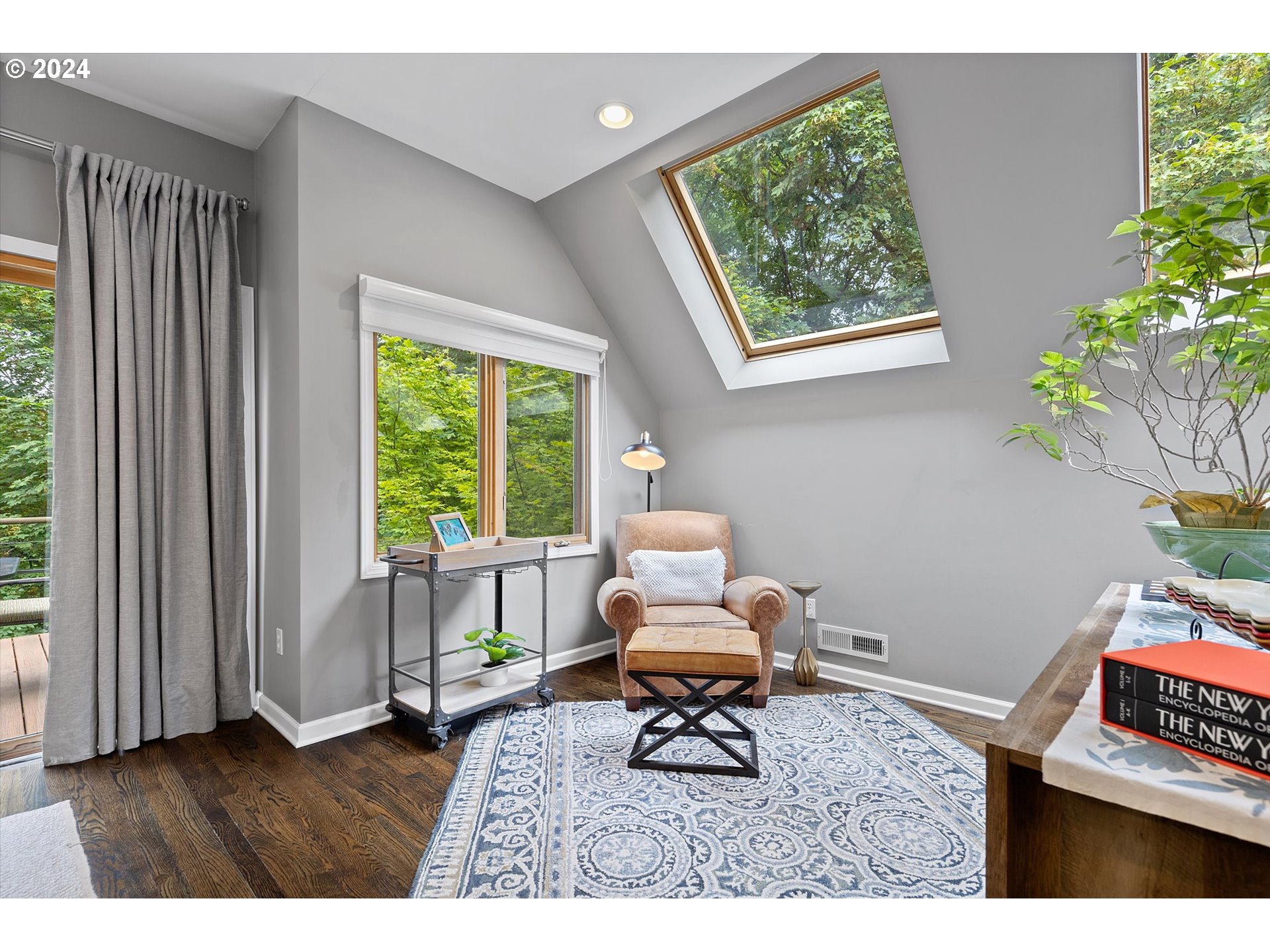3427 Southwest Dosch Road Portland, OR 97239 - Photo 5 of 48 a living room with furniture and a window