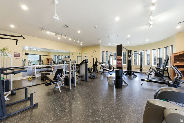 900 Bitner Road, Unit P20 Park City, UT 84098 - Photo 35 of 42 Spacious fitness center featuring a variety of exercise equipment, mirrored wall, recessed lighting, and ceiling fans