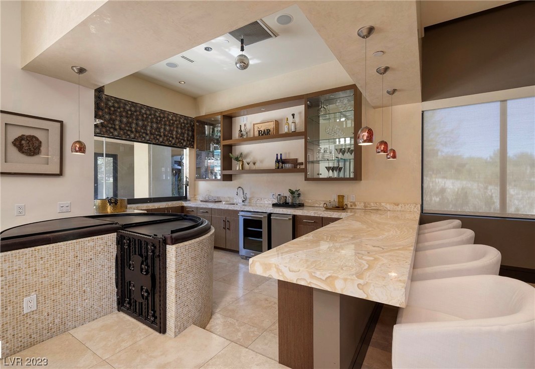 1465 MacDonald Ranch Drive Henderson, NV 89012 - Photo 31 of 63 Wet Bar w/Ice Maker and Wine Fridge