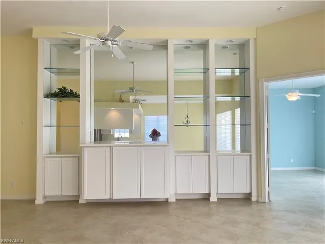 a bathroom with a glass door shower