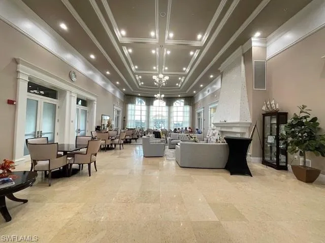 a view of swimming pool with outdoor seating and yard in back