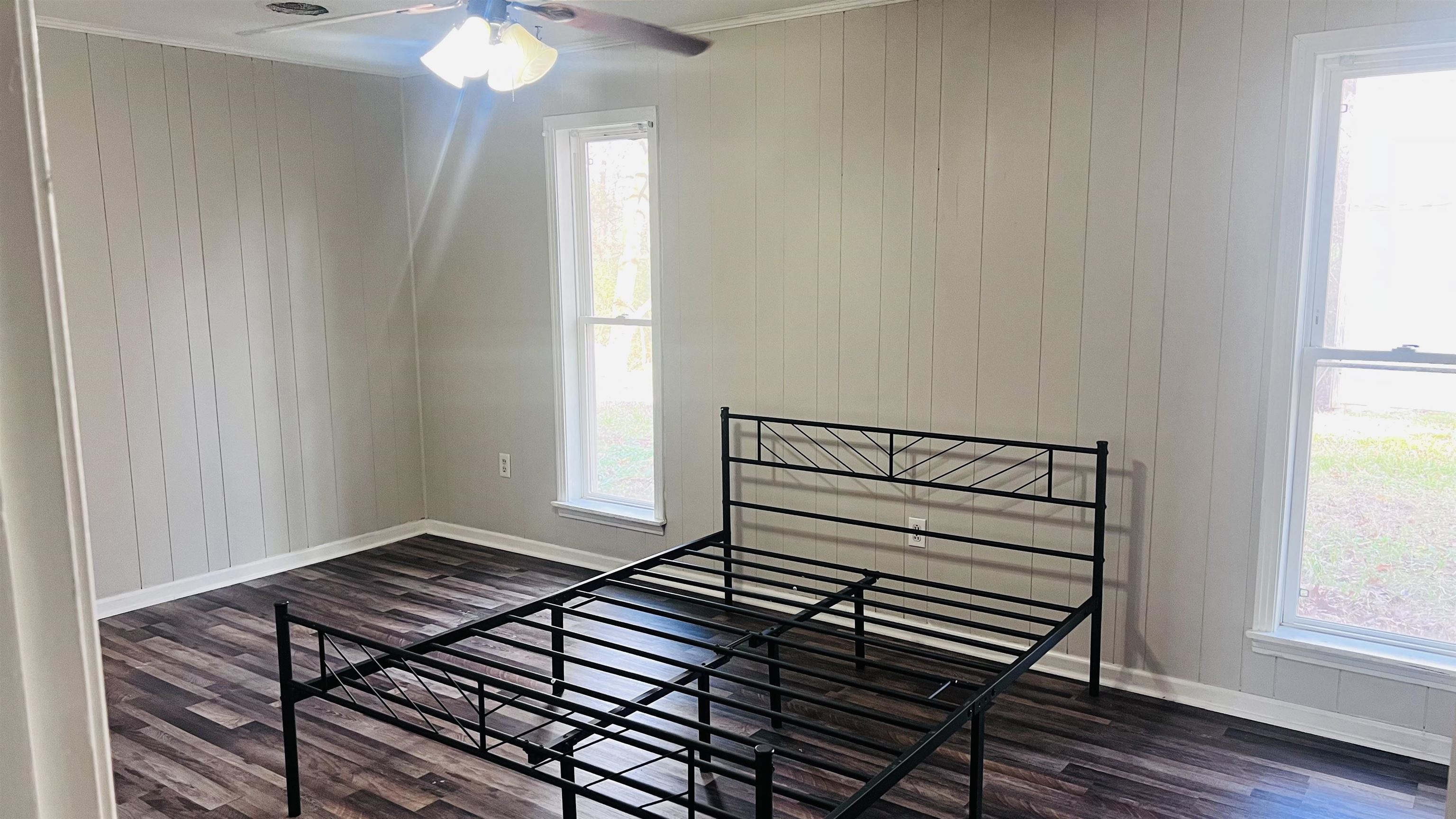 332 Waits Road Burlison, TN 38015 - Photo 14 of 23 a view of a livingroom with wooden floor and a window