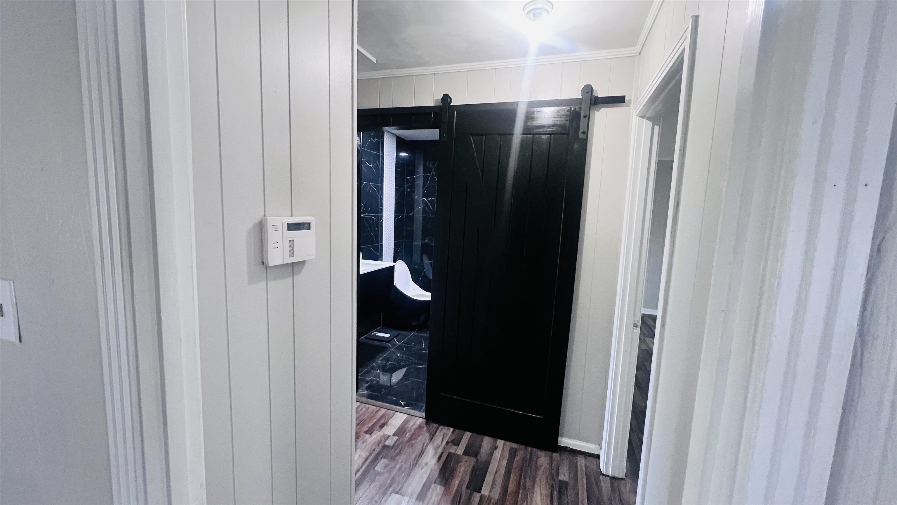 332 Waits Road Burlison, TN 38015 - Photo 23 of 23 a bathroom with a glass shower door and a sink