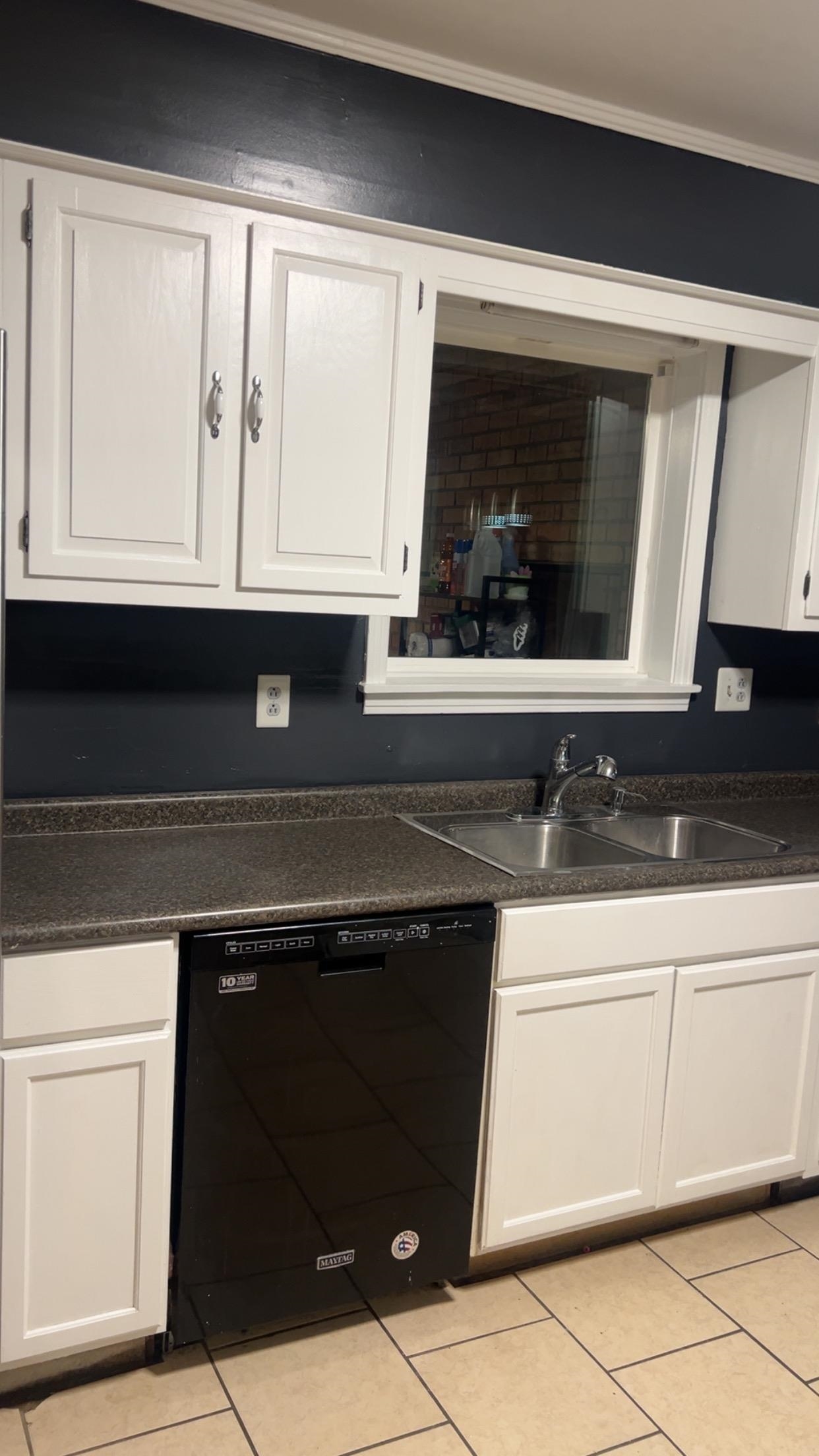 332 Waits Road Burlison, TN 38015 - Photo 3 of 11 a kitchen with granite countertop white cabinets and a stove