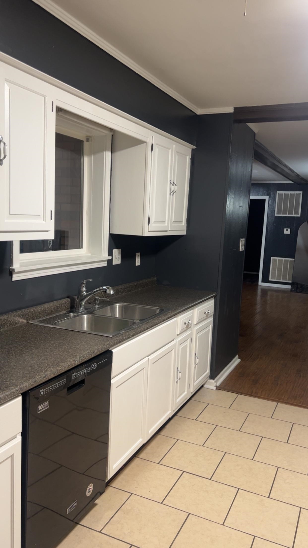 332 Waits Road Burlison, TN 38015 - Photo 4 of 11 a kitchen with granite countertop white cabinets and sink