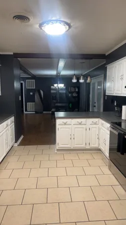 a view of hallway with wooden floor