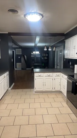 a bathroom with a sink a mirror and shower