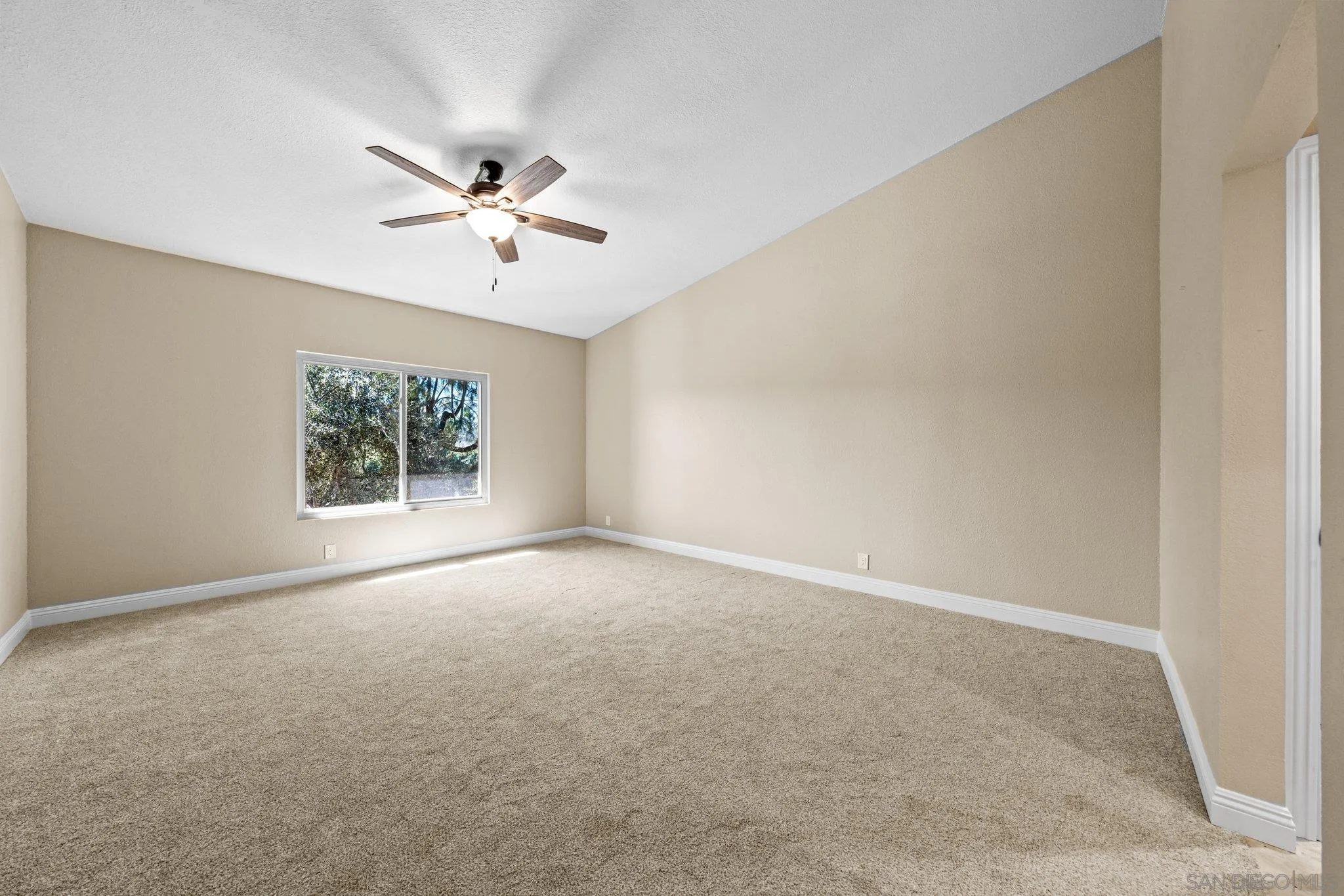 31241 Old River Road Bonsall, CA 92003 - Photo 20 of 51 an empty room with windows and fan
