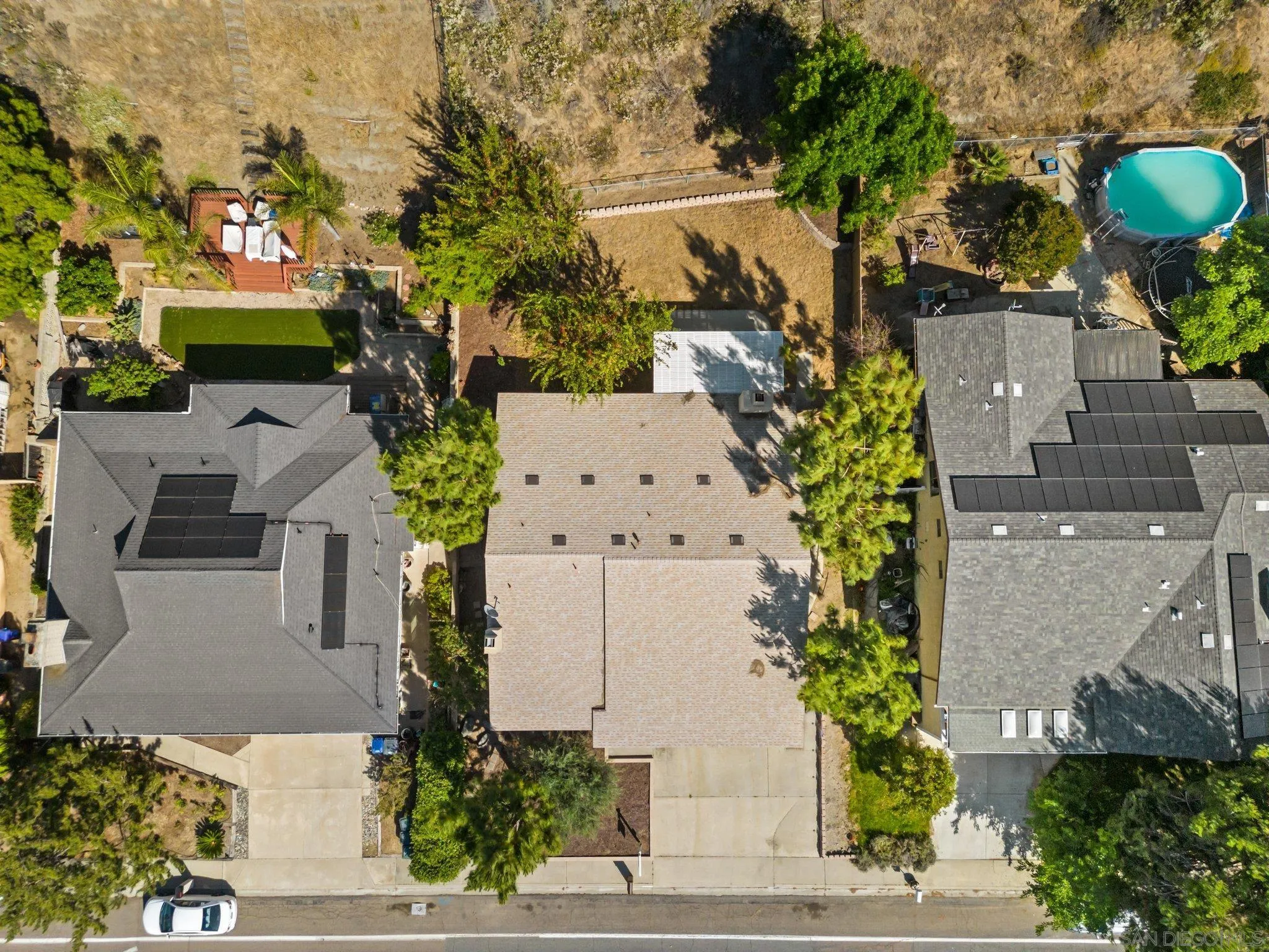 31241 Old River Road Bonsall, CA 92003 - Photo 2 of 51 an aerial view of a house with a garden and swimming pool