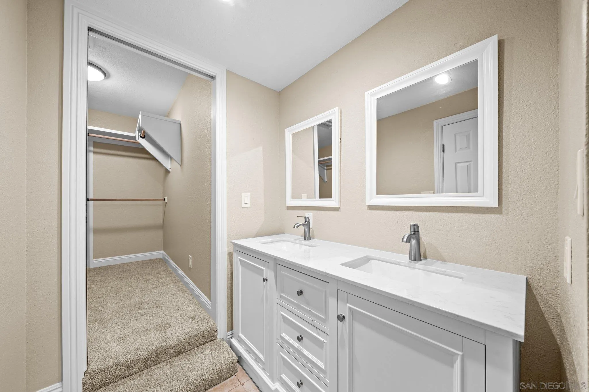 31241 Old River Road Bonsall, CA 92003 - Photo 22 of 51 a bathroom with a sink and a mirror