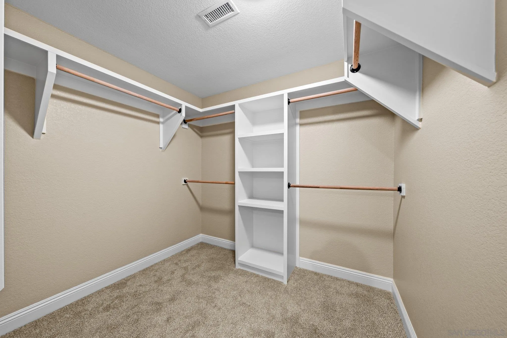 31241 Old River Road Bonsall, CA 92003 - Photo 23 of 51 a view of an empty walk in closet