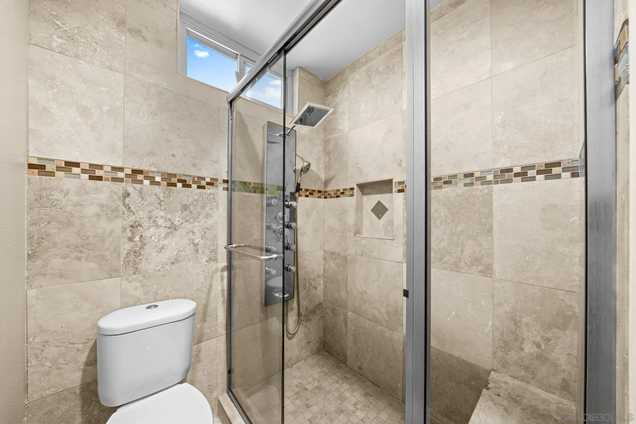 31241 Old River Road Bonsall, CA 92003 - Photo 24 of 51 a bathroom with a toilet and shower