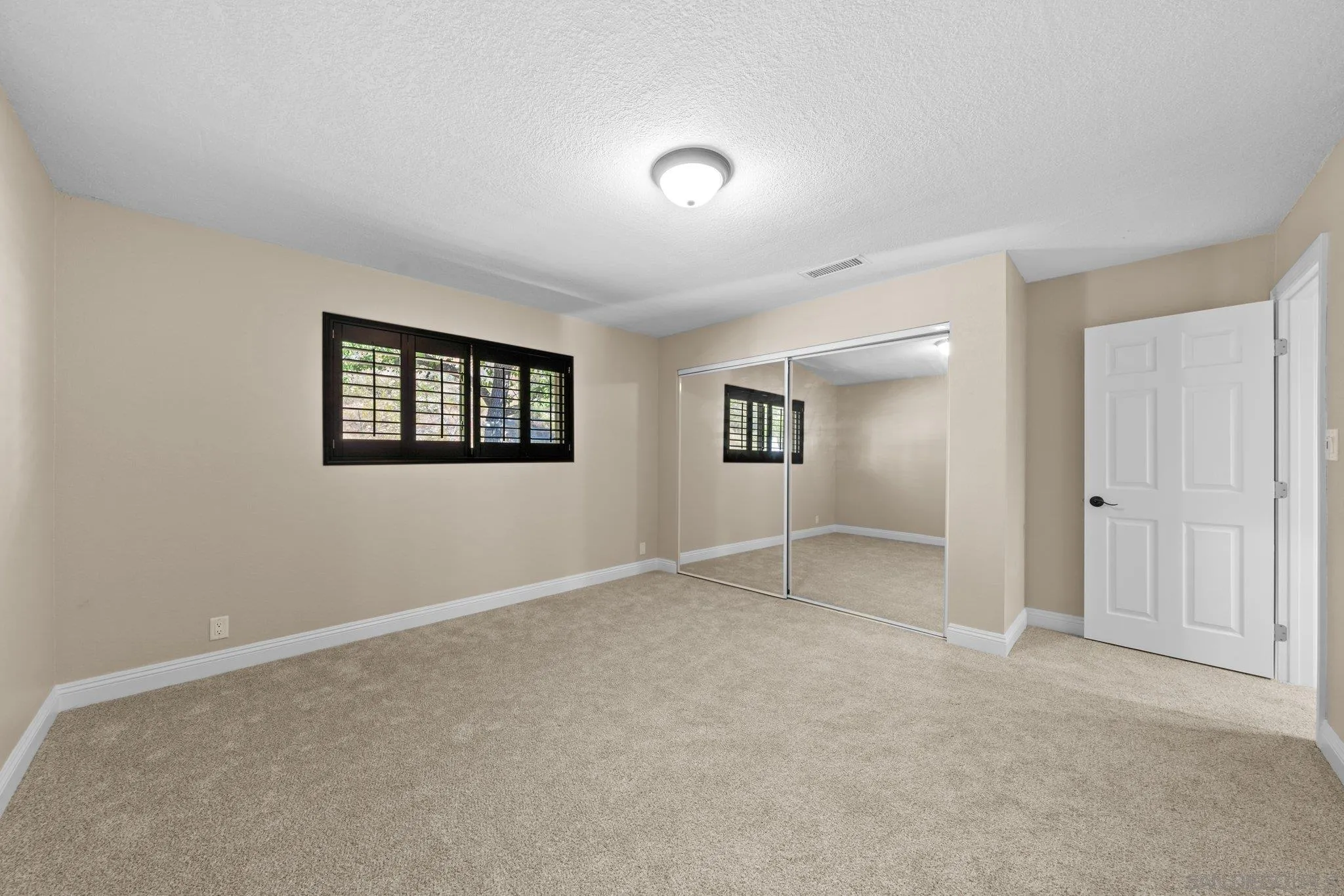 31241 Old River Road Bonsall, CA 92003 - Photo 27 of 51 a view of an empty room with a window