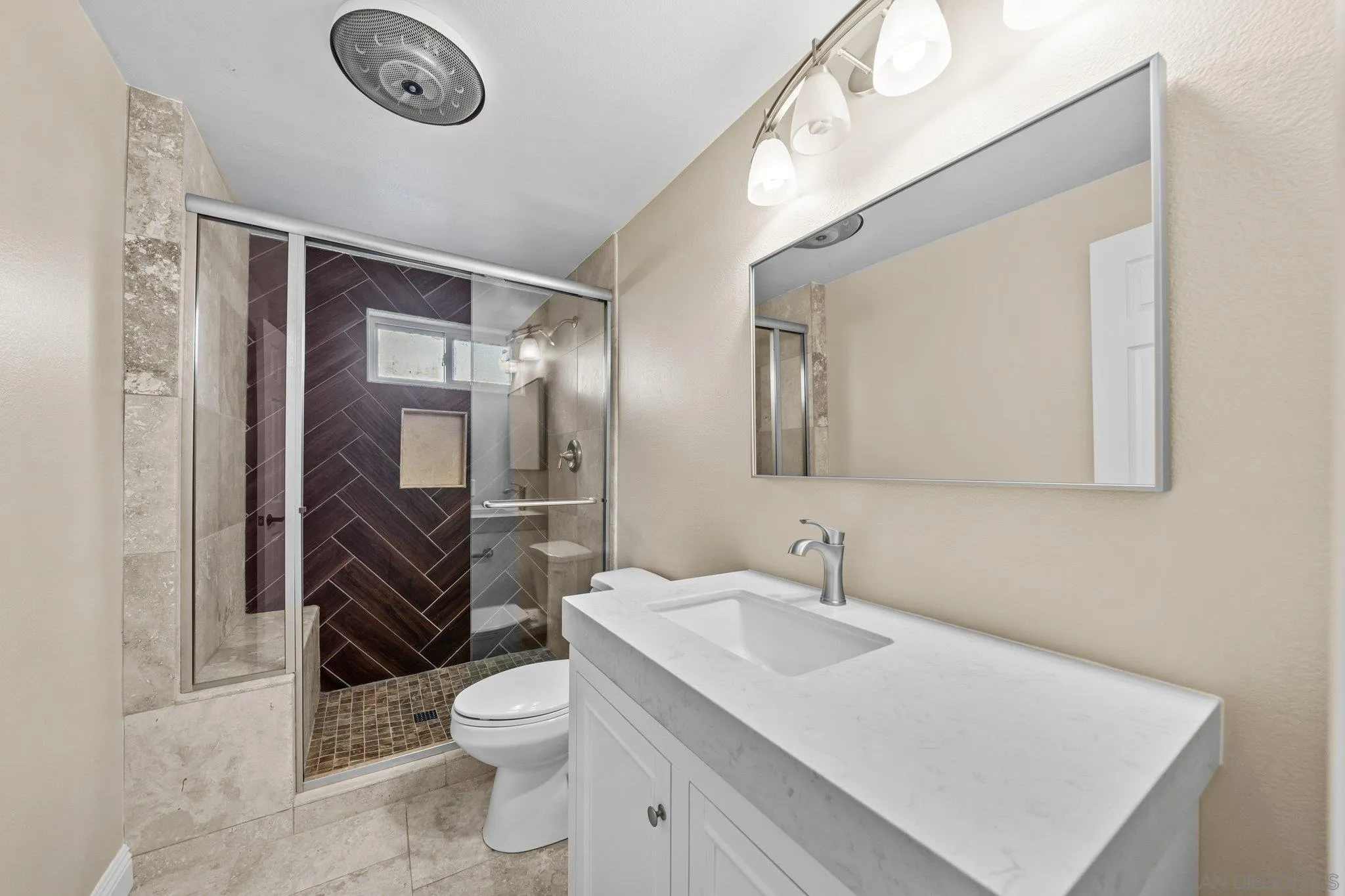 31241 Old River Road Bonsall, CA 92003 - Photo 30 of 51 a bathroom with a sink toilet and shower