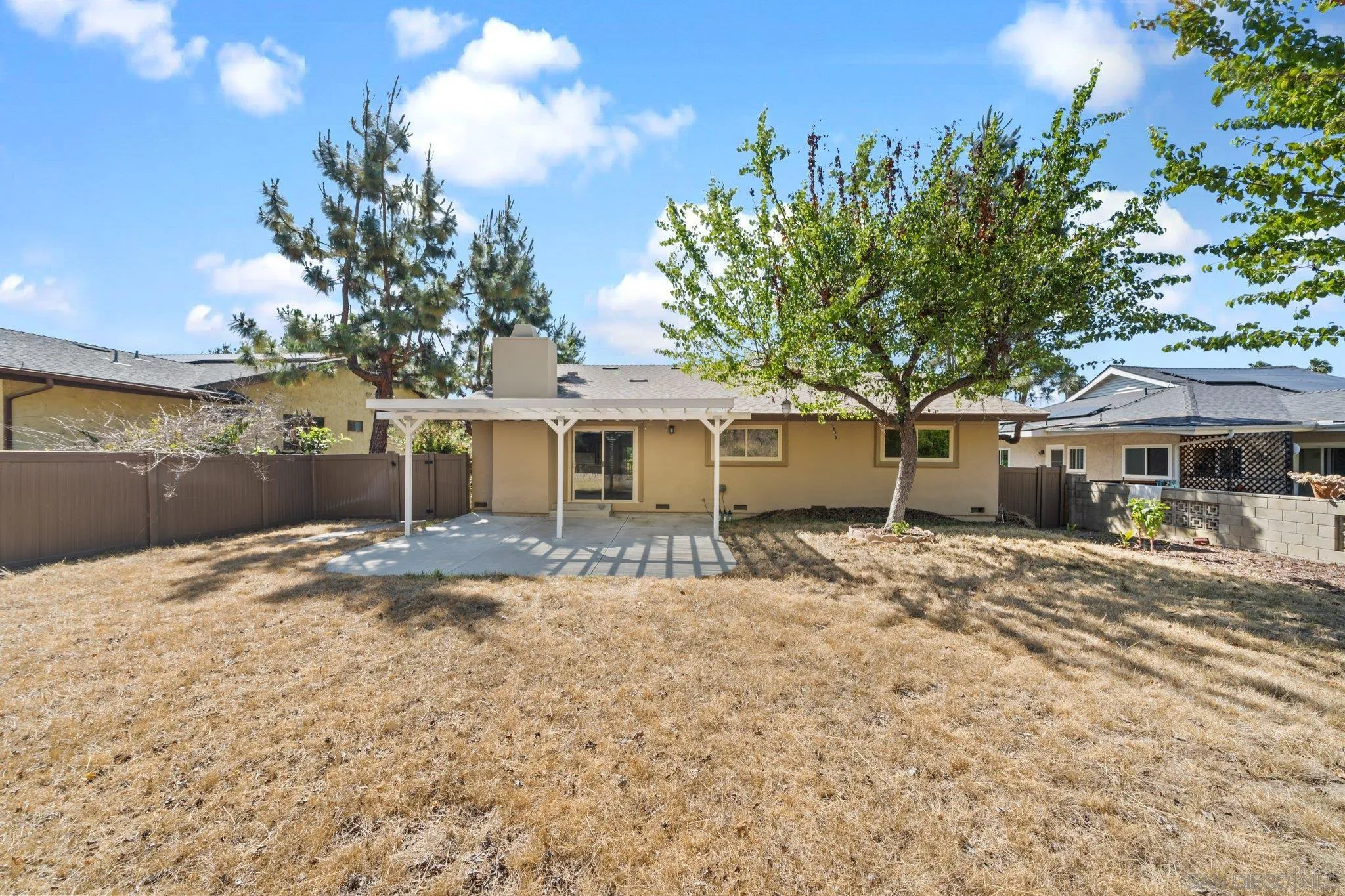 31241 Old River Road Bonsall, CA 92003 - Photo 35 of 51 a front view of a house with a yard and garage