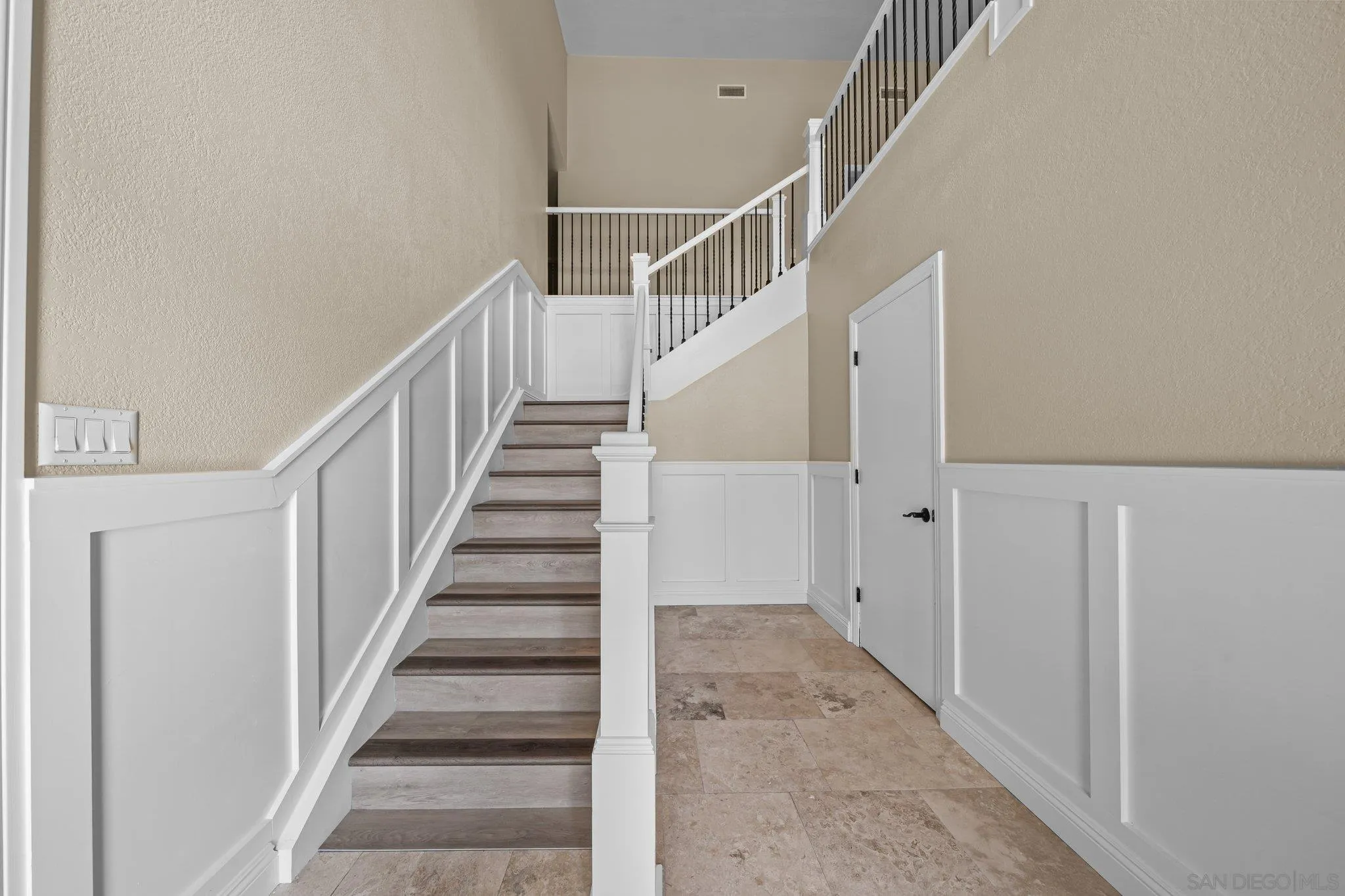 31241 Old River Road Bonsall, CA 92003 - Photo 36 of 51 a view of staircase with wooden floor and white walls