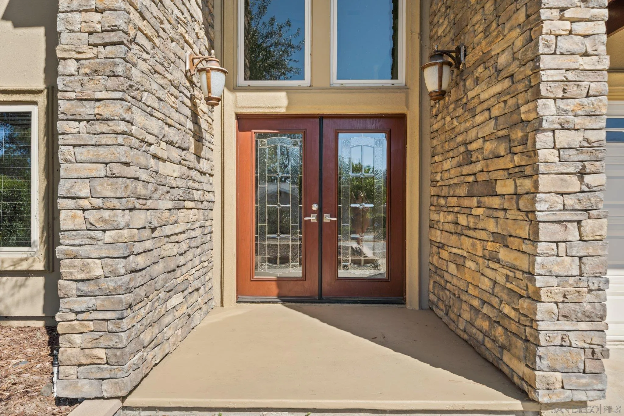 31241 Old River Road Bonsall, CA 92003 - Photo 4 of 51 a view of front door of house with a street