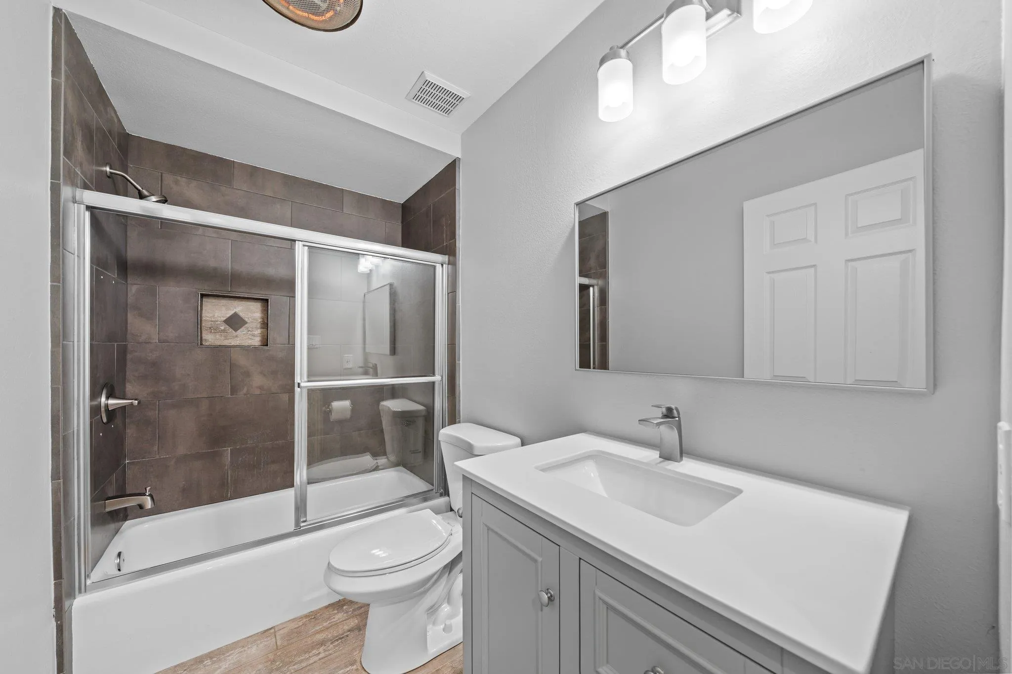 31241 Old River Road Bonsall, CA 92003 - Photo 42 of 51 a bathroom with a sink toilet and shower