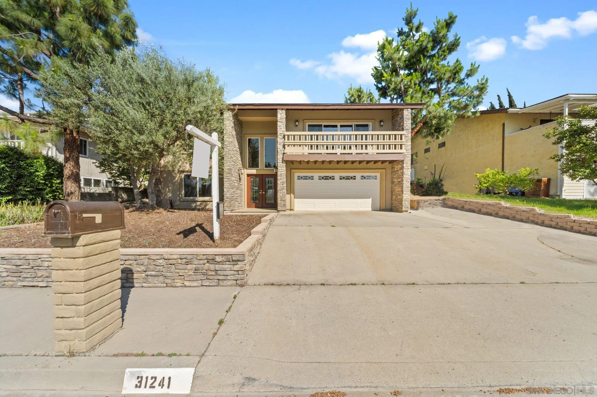 31241 Old River Road Bonsall, CA 92003 - Photo 48 of 51 a view of a house with a patio