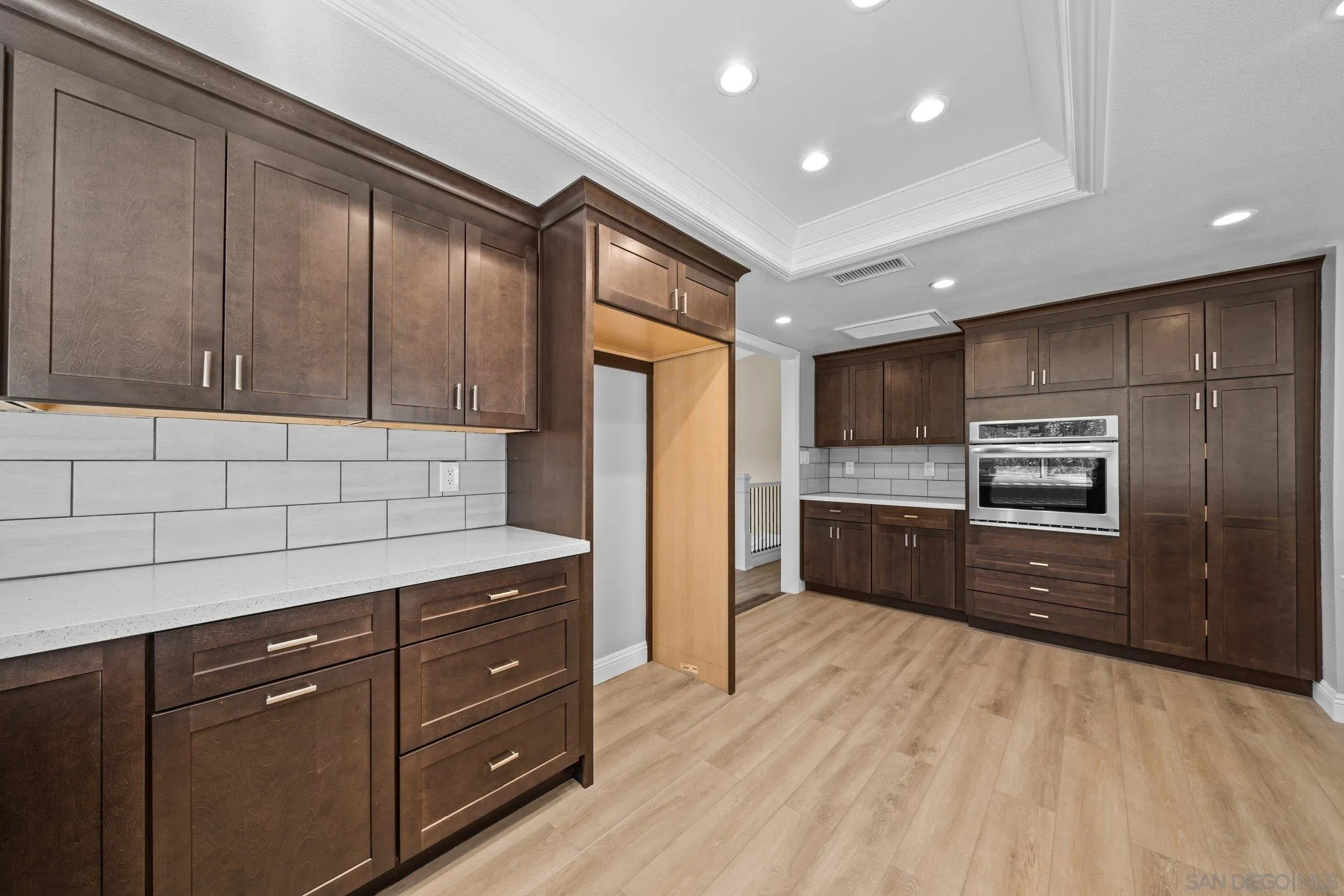 31241 Old River Road Bonsall, CA 92003 - Photo 9 of 51 a kitchen with granite countertop stainless steel appliances and cabinets