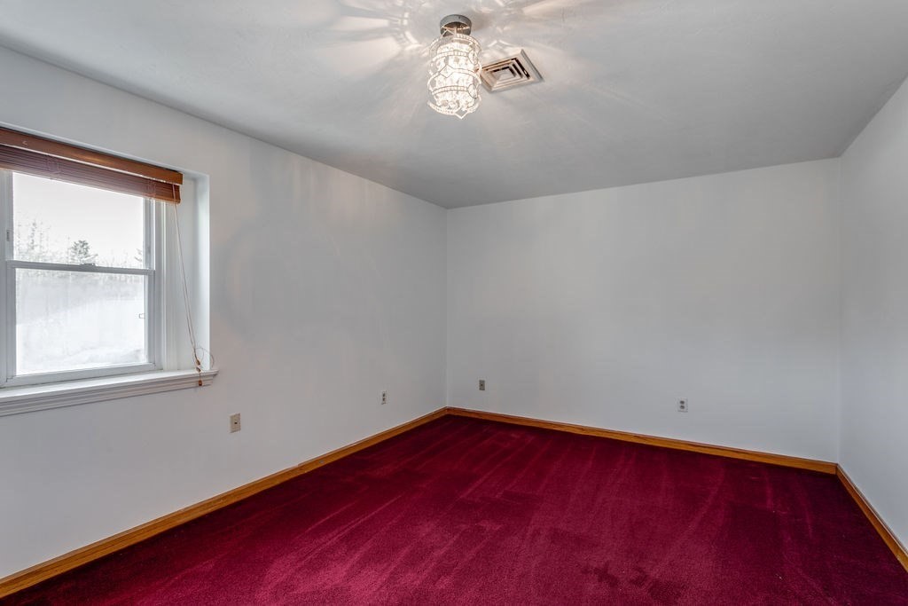 23 B Highfield Road, Unit 23B Charlton, MA 01507 - Photo 15 of 26 an empty room with a window